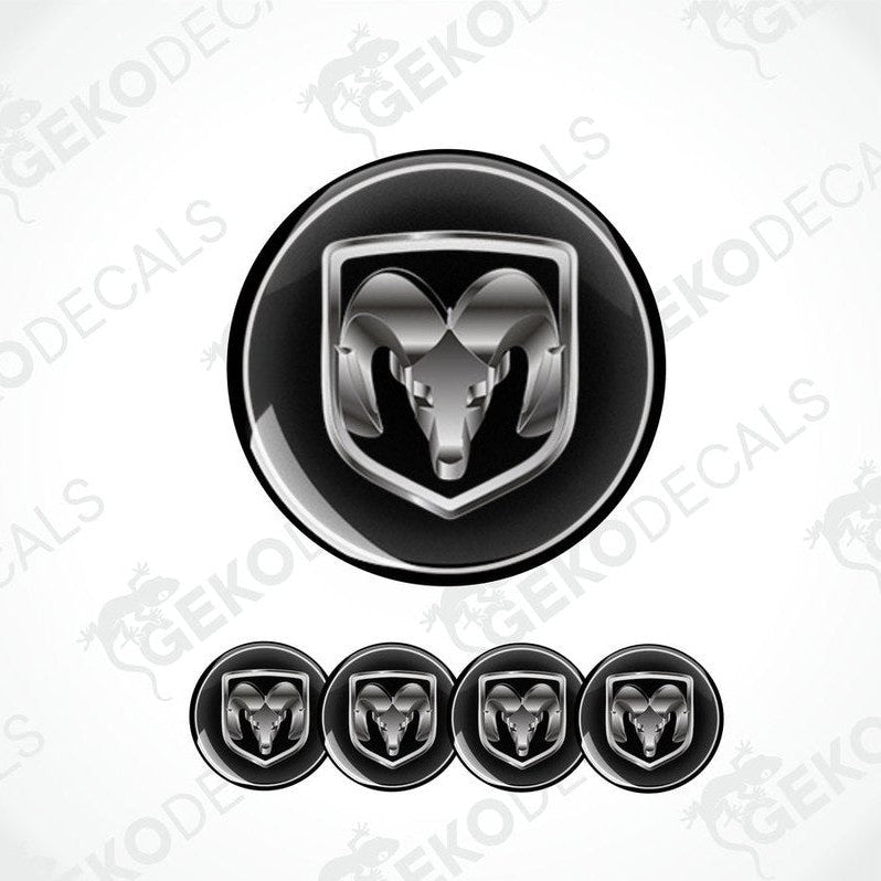 A set of four black vinyl stickers with the word silver metallic 'DODGE'.