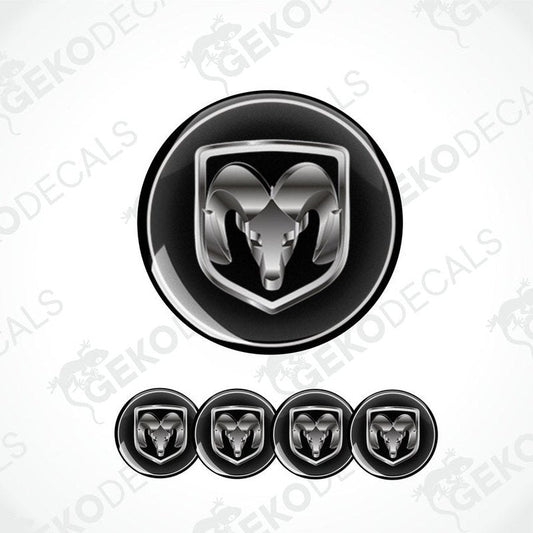 A set of four black vinyl stickers with the word silver metallic 'DODGE'.