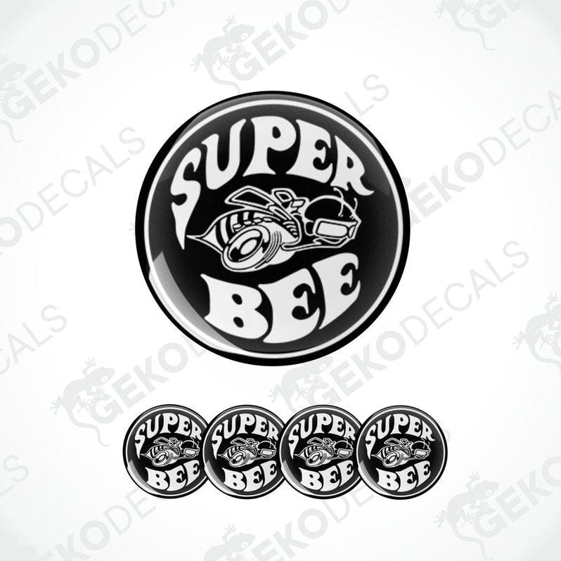 A set of four black vinyl stickers with the text 'SUPER BEE' and an illustration of a bee. Each sticker has a white background with a black design.