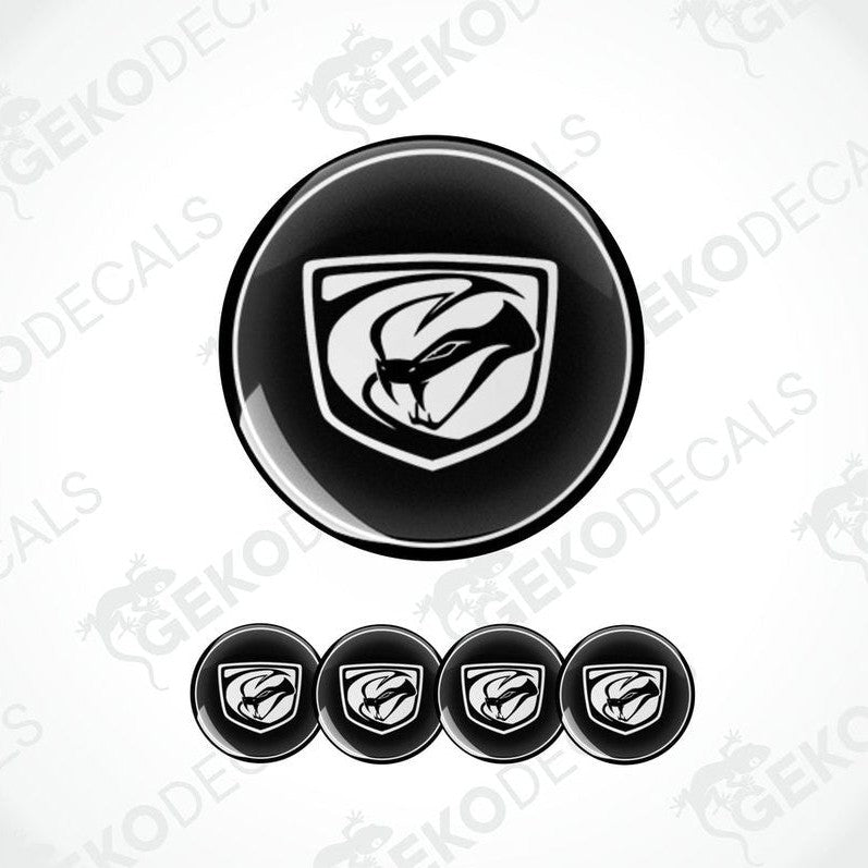 A set of four black vinyl stickers with a geometric DODGE Viper design, displayed against a white background.