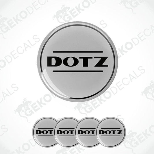 A set of four vinyl decals with 'DOTZ' branding, designed for use as car wheel caps.