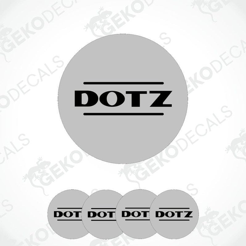 A set of four grey vinyl stickers with the word 'DOTZ' printed on them