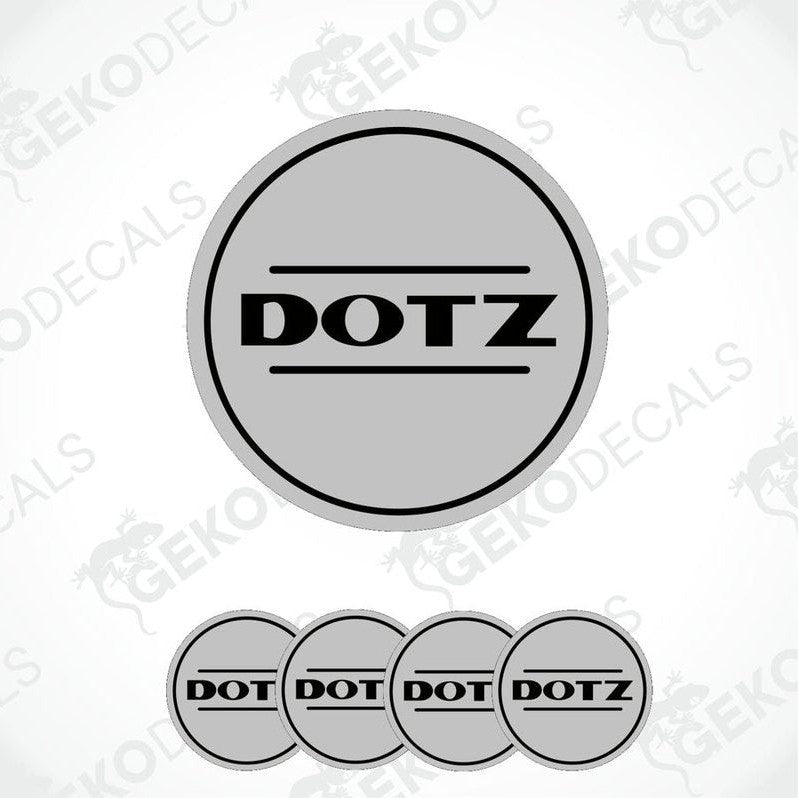 A set of four vinyl decals with 'DOTZ' branding, designed for use as car wheel caps.
