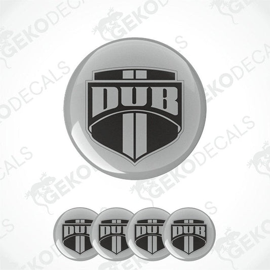 A set of four circular vinyl stickers with a polyurethane coating featuring the 'DUB' logo in black and silver.