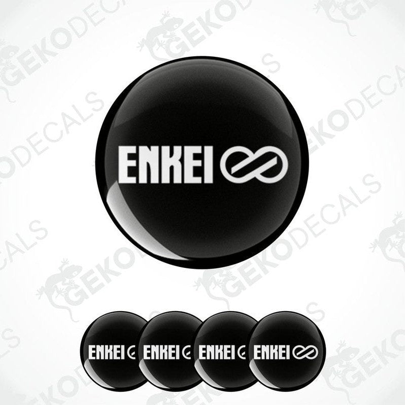 A set of four black vinyl stickers with the word 'ENKEI' and an associated symbol printed on them.