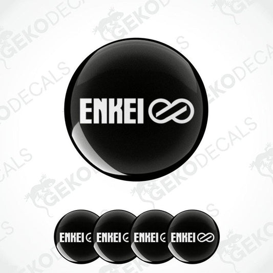 A set of four black vinyl stickers with the word 'ENKEI' and an associated symbol printed on them.