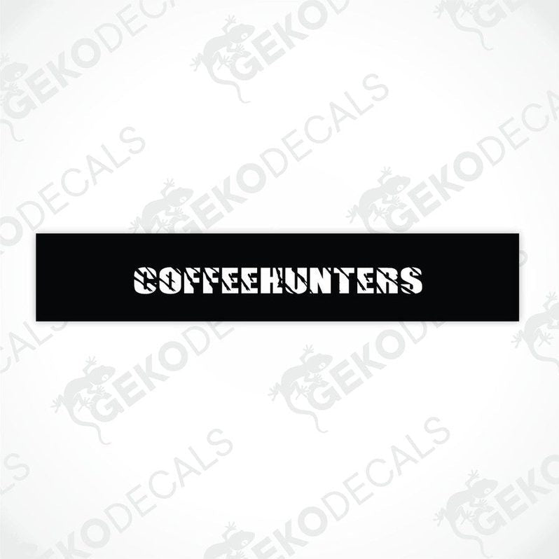 Black car windshield sun visor with white text EXTREMHUNTERS