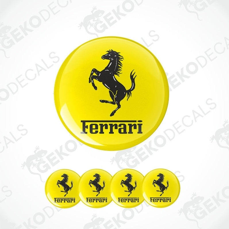 A set of yellow vinyl decals with the Ferrari logo applied on them, displayed against a white background.