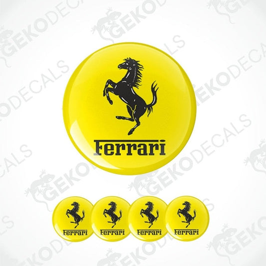 A set of yellow vinyl decals with the Ferrari logo applied on them, displayed against a white background.
