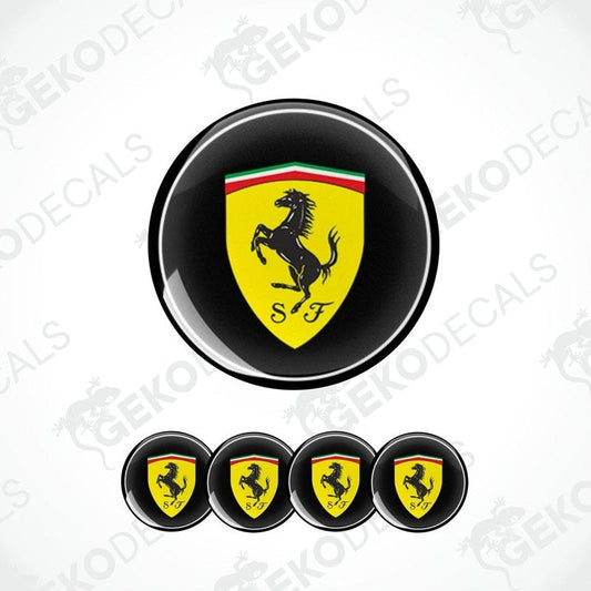 A set of four round vinyl stickers with a red, yellow, green, and black design featuring the Ferrari logo.