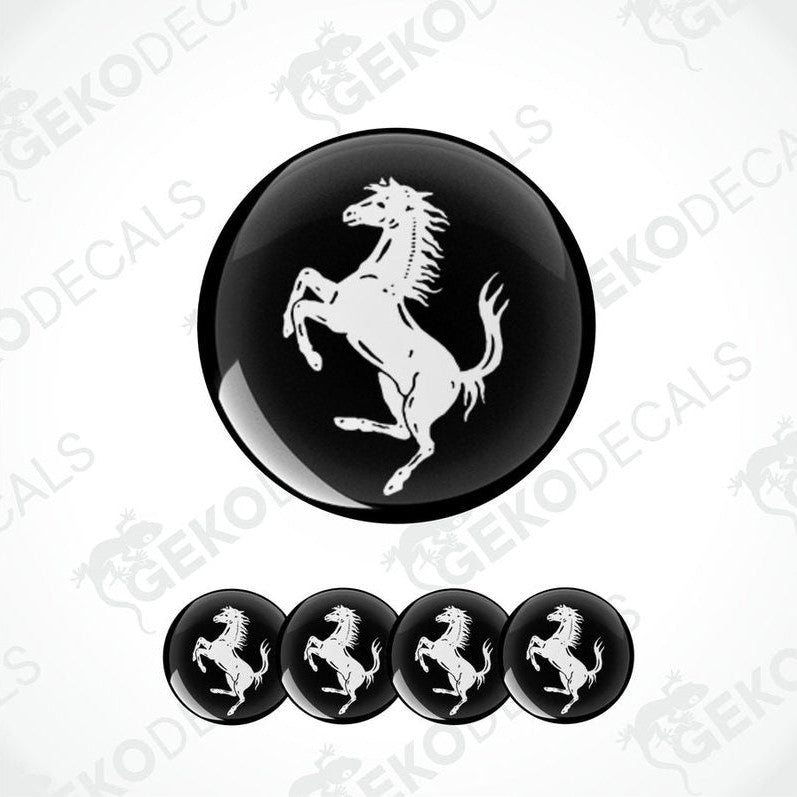 Set of vinyl decals with a white FERRARI horse logo on a black background, including four round decals for car wheels.