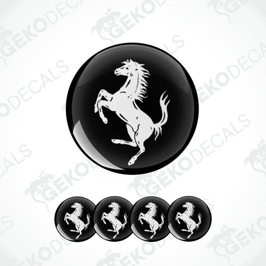 Set of vinyl decals with a white FERRARI horse logo on a black background, including four round decals for car wheels.