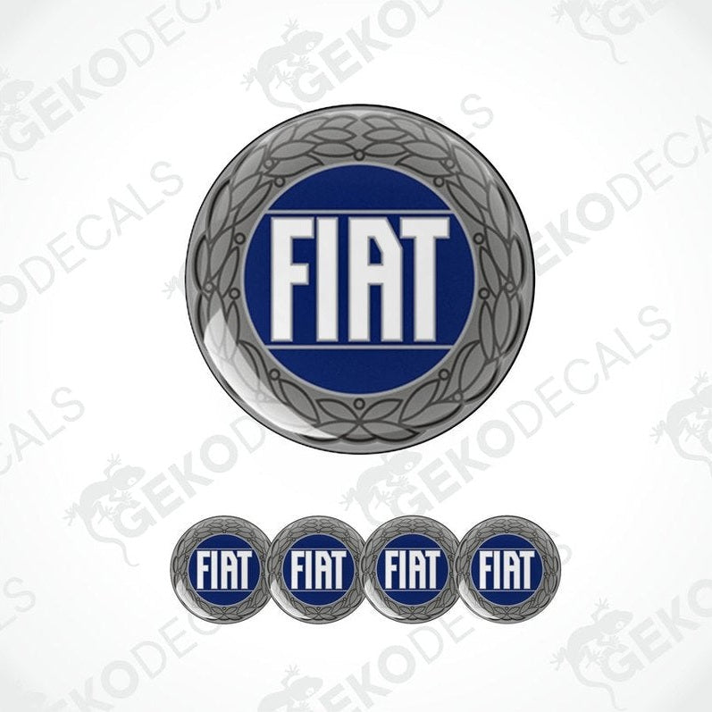 A set of four grey-colored vinyl stickers with the word 'FIAT' embossed in blue, displayed against a white background.