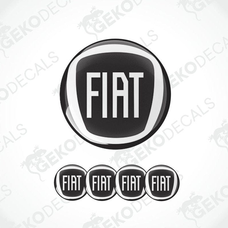 A set of black and white vinyl decals with the Fiat brand logo, including four domed stickers with the Fiat text on them.