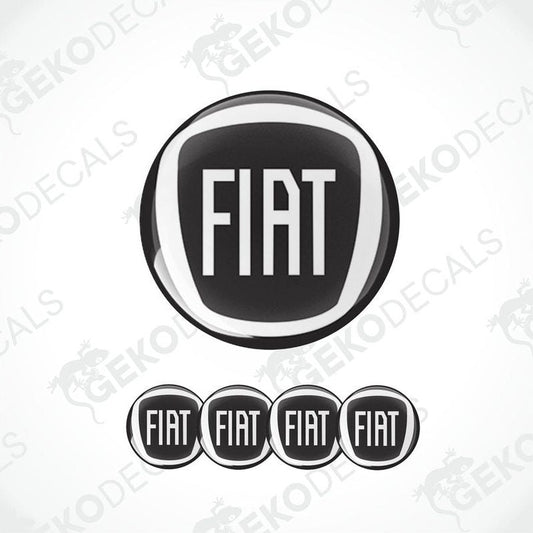 A set of black and white vinyl decals with the Fiat brand logo, including four domed stickers with the Fiat text on them.