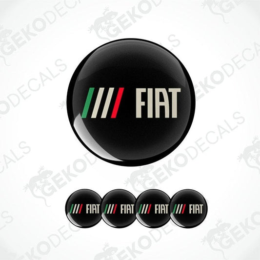 A set of four round car decals with the Fiat brand logo, predominantly black with a colorful stripe and white lettering.
