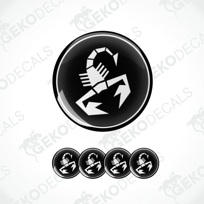 A set of black and white vinyl decals with a polyurethane coating, featuring a scorpion design, commonly associated with the Abarth brand.