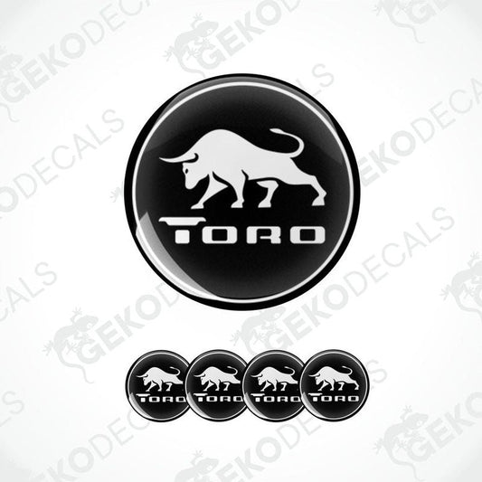 A set of black and white vinyl decals with the Toro brand logo, designed for use as car stickers.