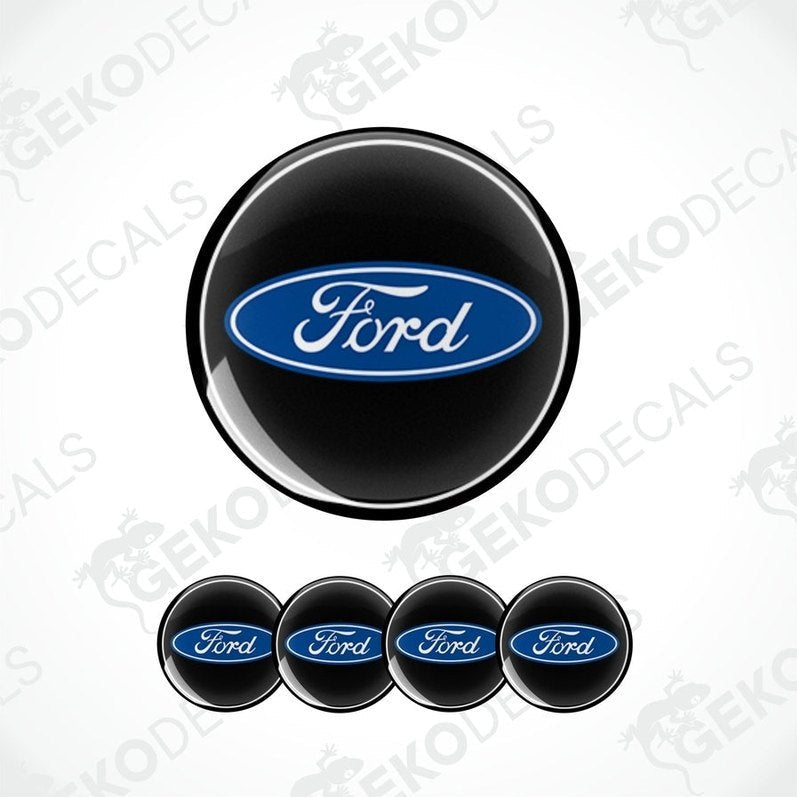 A set of four black vinyl stickers with the Ford logo in blue and white.