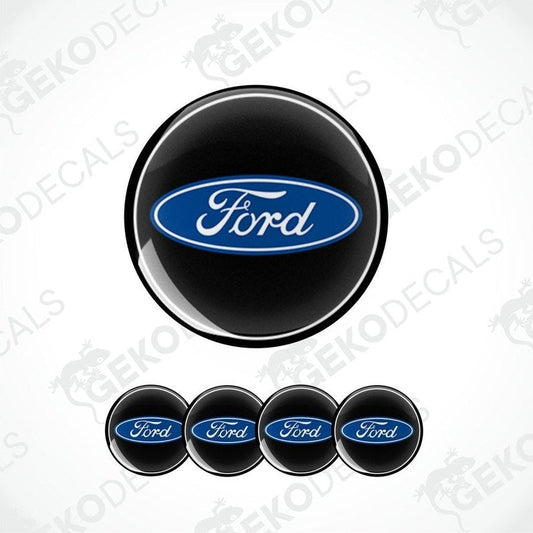 A set of four black vinyl stickers with the Ford logo in blue and white.