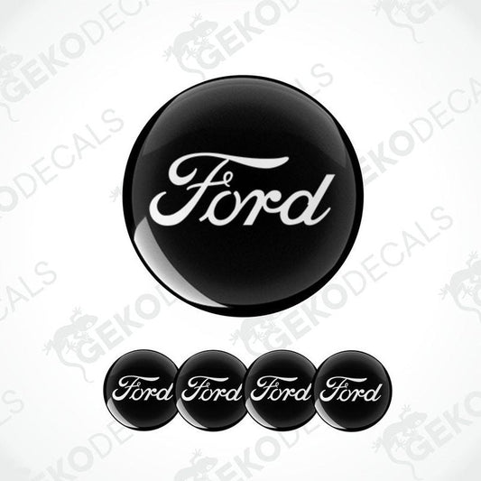 A set of four black and white Ford branded vinyl decals.