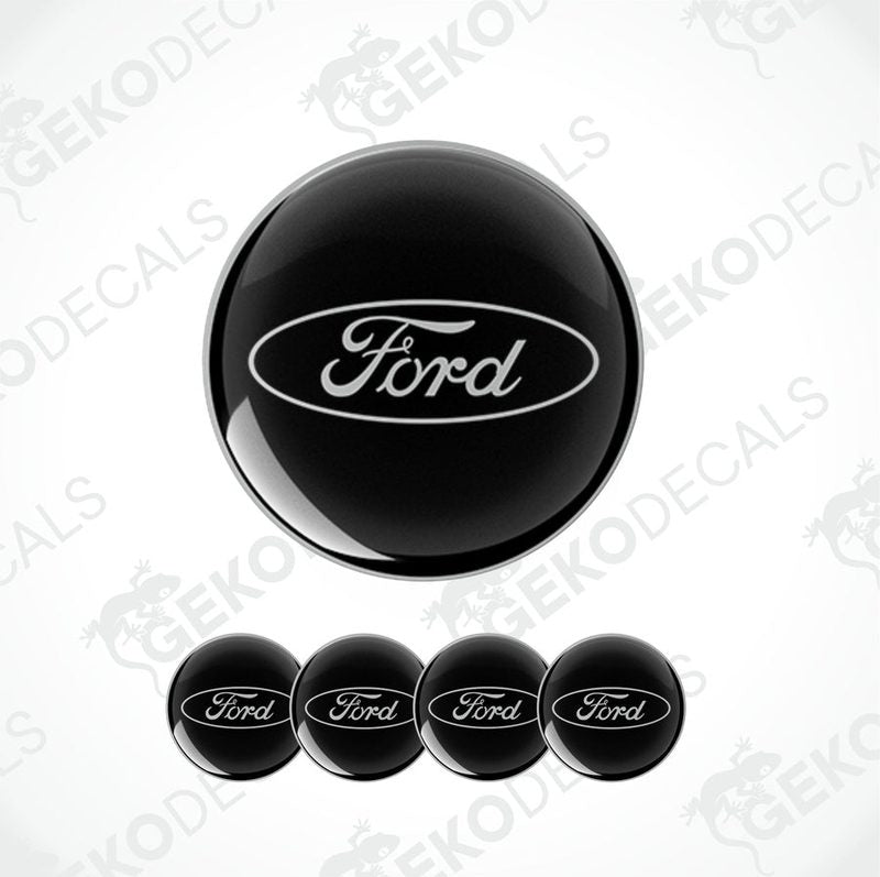 A set of four black vinyl stickers with the word 'FORD' printed on them, designed for use as car decals.