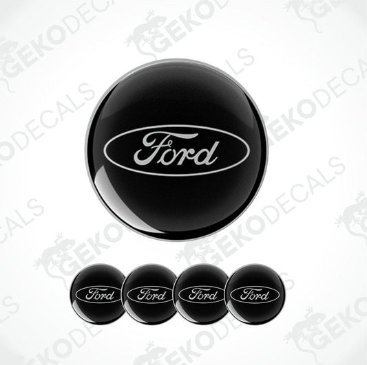 A set of four black vinyl stickers with the word 'FORD' printed on them, designed for use as car decals.