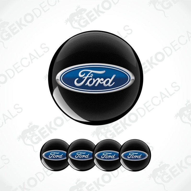 A set of four black, blue, and white Ford branded vinyl decals.