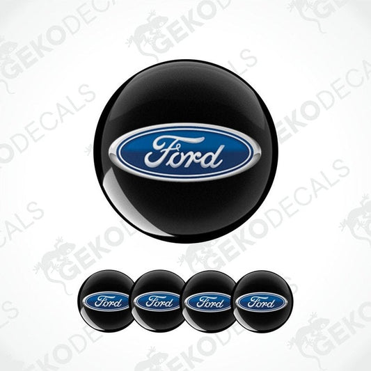 A set of four black, blue, and white Ford branded vinyl decals.