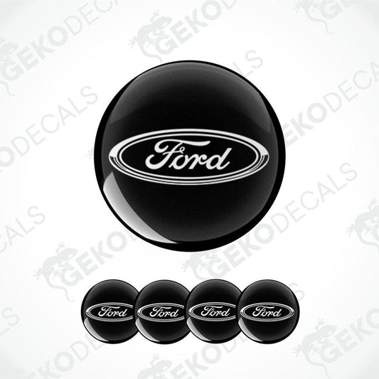A set of black vinyl decals with the Ford logo, including four different sizes suitable for vehicle upholstery.
