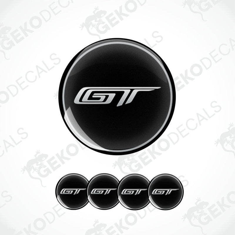 A set of four black vinyl stickers with the letter 'GT' and the FORD brand logo in white.