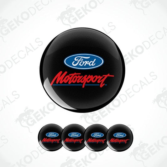 A set of four black vinyl stickers with the FORD MOTORSPORT logo in red and blue.
