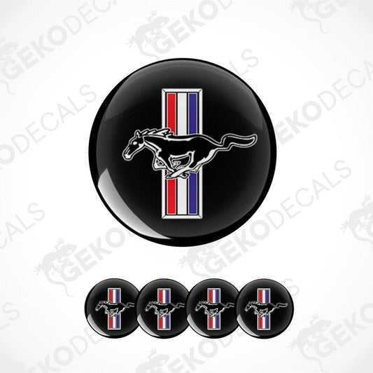 A set of four black vinyl stickers with a depiction of a horse and the Ford Mustang logo, featuring red, white, and blue stripes.