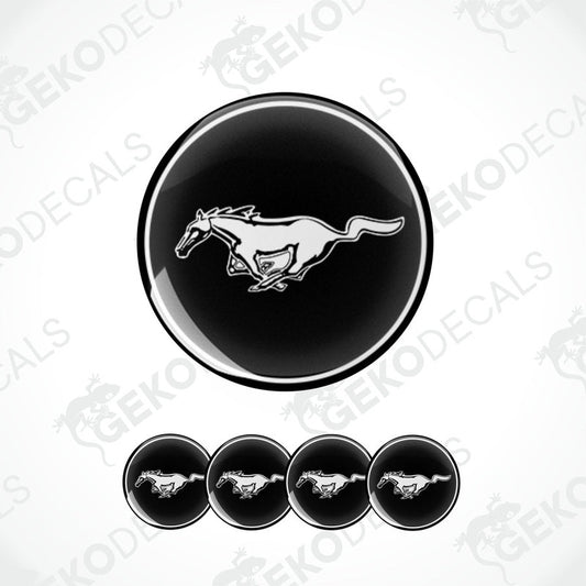 A set of four black and white vinyl decals with a Ford Mustang horse logo.