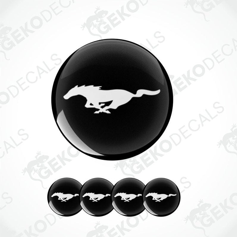 A set of four black and white vinyl decals with the Ford Mustang horse logo.