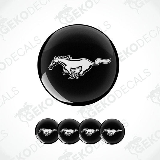 A set of four black and white vinyl decals with a Ford Mustang horse logo.