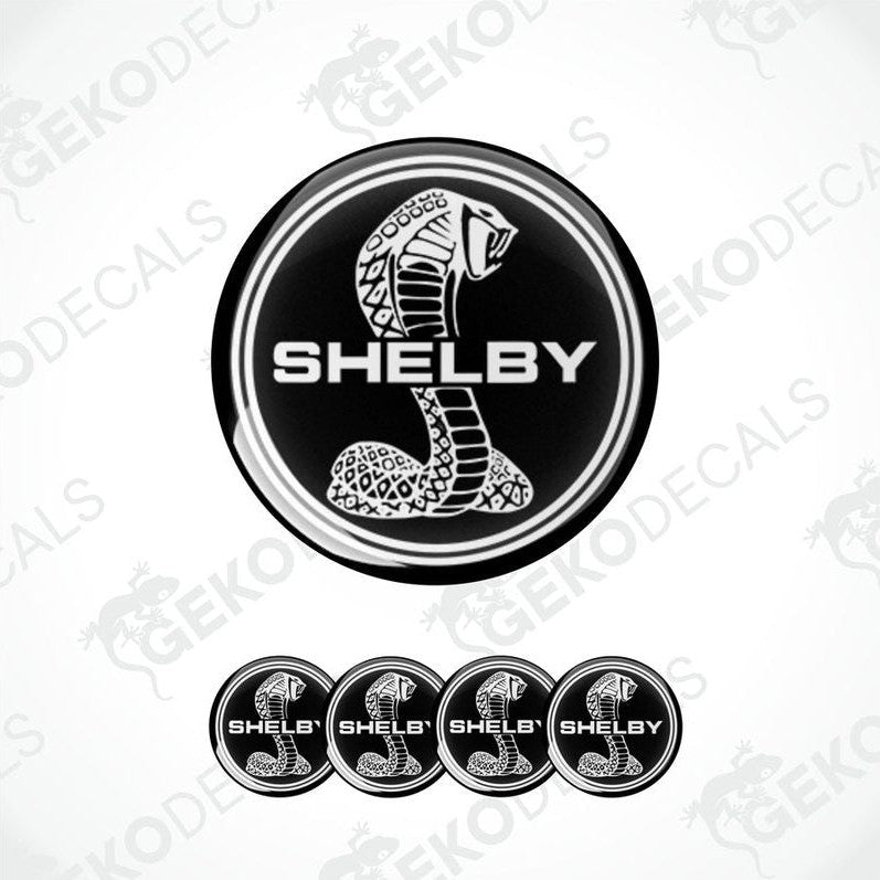 Set of vinyl decals with a Shelby logo, including four different designs featuring a cobra and the text 'Shelby'.