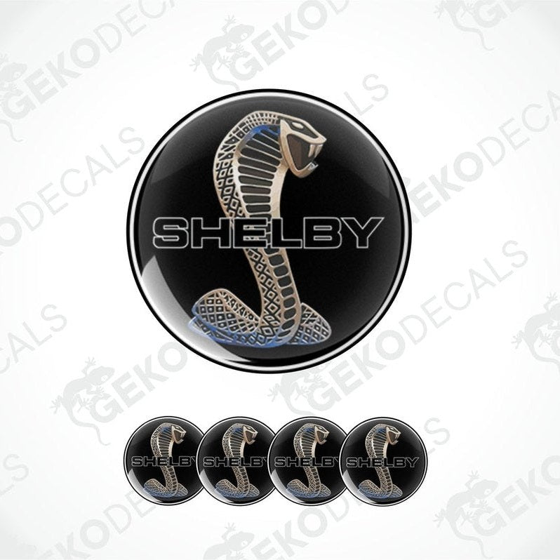 A set of four black vinyl stickers with a design of a snake, branded with 'SHELBY' logo.
