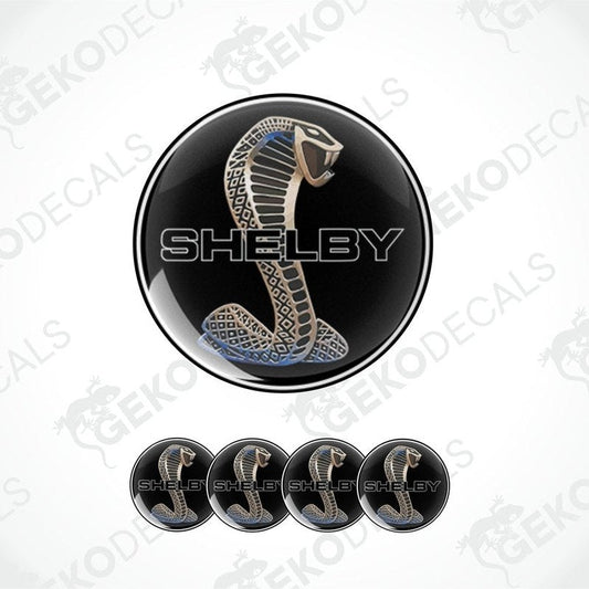 A set of four black vinyl stickers with a design of a snake, branded with 'SHELBY' logo.