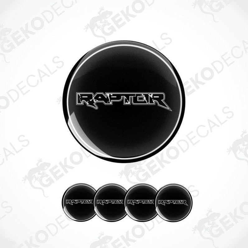 A set of black vinyl decals with the word 'FORD RAPTOR' on them, typically used as car wheel stickers.