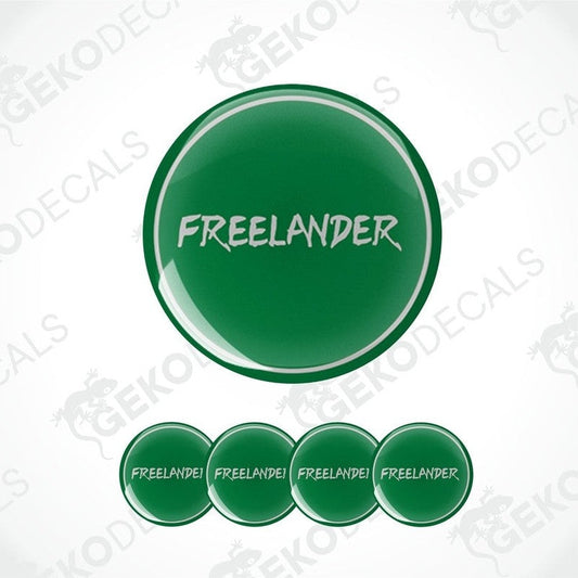 A set of four green vinyl decals with the word 'FREELANDER' printed on them, presented against a white background.