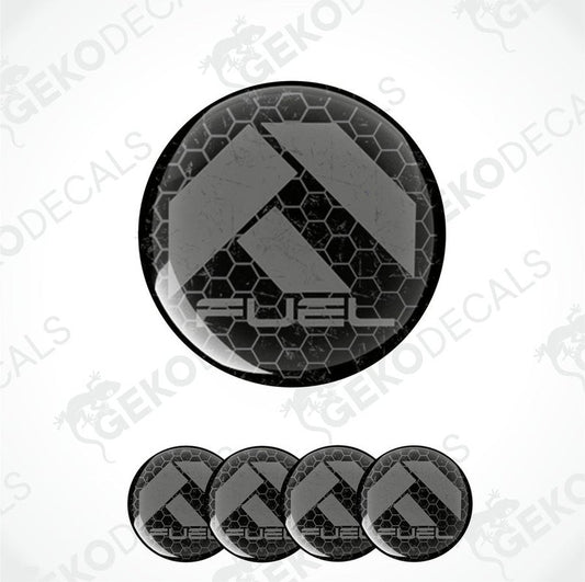 A set of black vinyl decals with the word 'FUEL' on them, presented against a white background.
