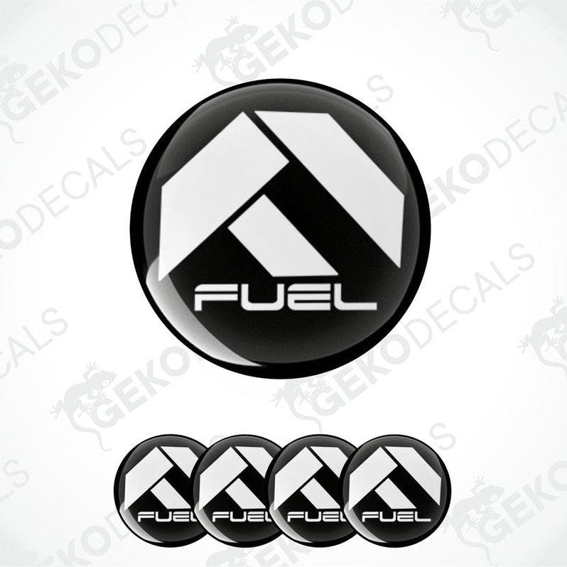 A set of four vinyl decals with 'FUEL' text and a geometric design, predominantly black and white.