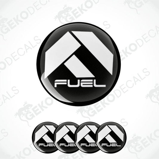 A set of four vinyl decals with 'FUEL' text and a geometric design, predominantly black and white.