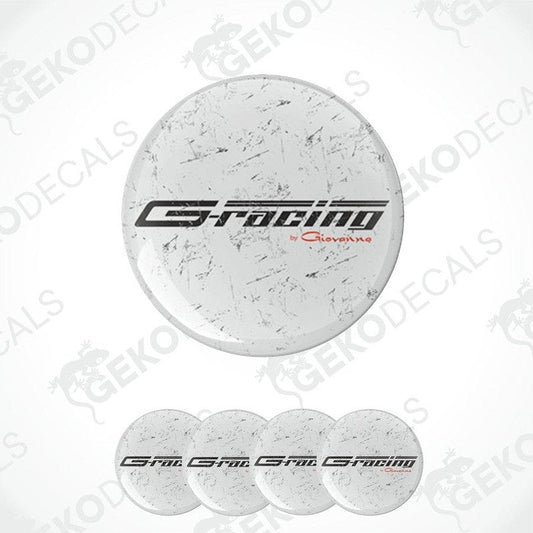 A set of vinyl decals with 'G-RACING' text in a sports car logo style, presented in a circular arrangement, predominantly white with a grey marble pattern.