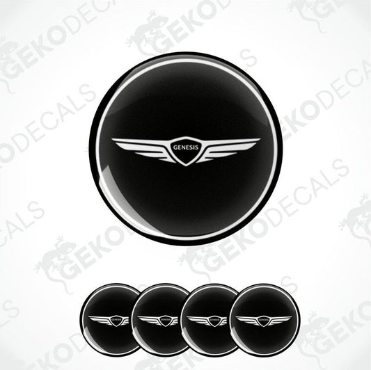 Set of four black and white polyurethane-coated vinyl stickers designed for use as car wheel covers. With GENESIS logo