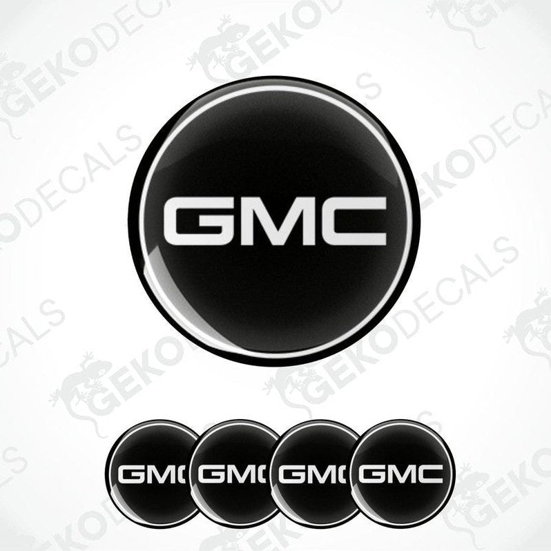 A set of four black and white vinyl decals with the GMC logo.