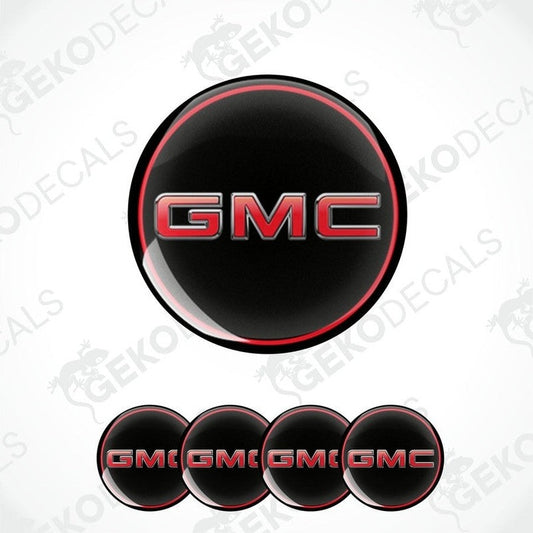 A set of four round GMC brand vinyl stickers with a red and black color scheme and a polyurethane coating.