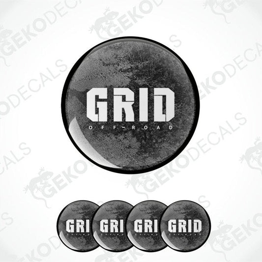 A set of four round vinyl stickers with the text 'GRID OFF-ROAD' on a black background, arranged in a stacked layout.