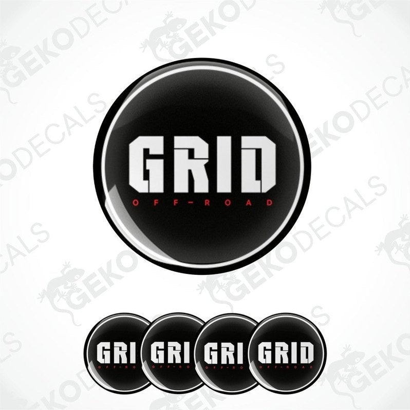A set of four black vinyl stickers with the word 'GRID' and 'OFF-ROAD' printed on them, arranged in a circular pattern with a white background.